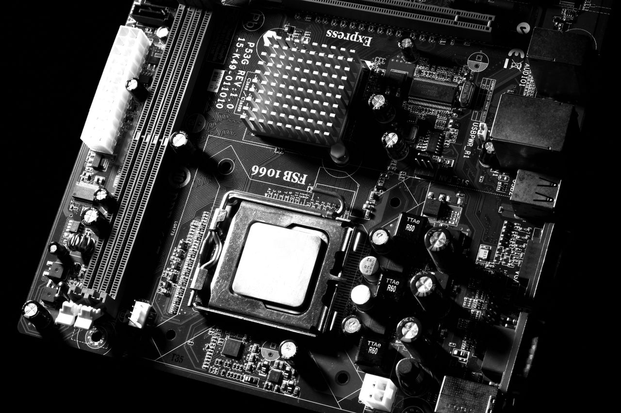 Crafting Captivating Headlines: Your awesome post title goes here Monochrome detailed close-up of computer motherboard circuitry showcasing components and tech intricacies.